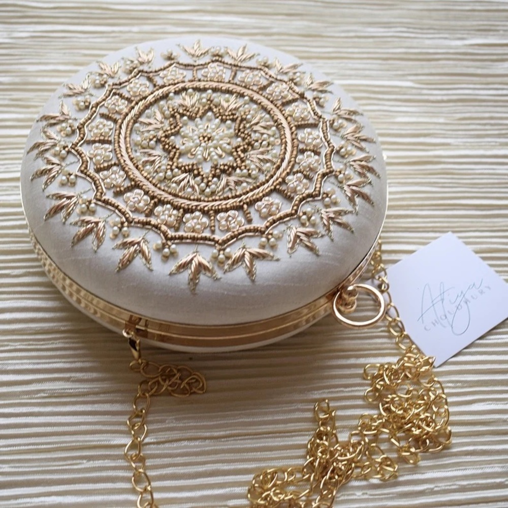 Ivory Round Clutch
